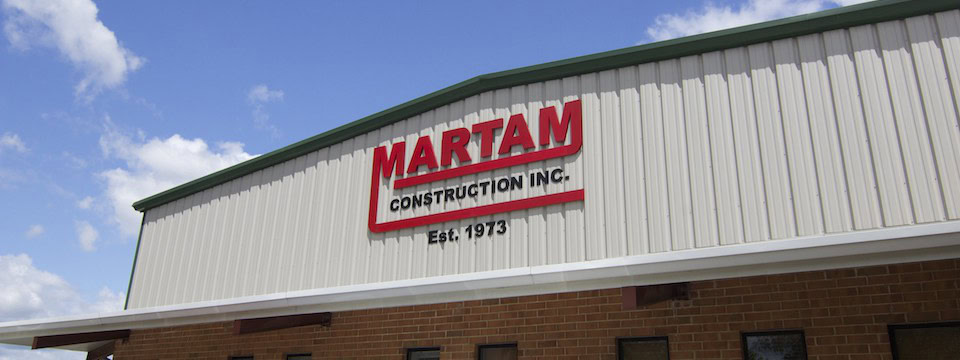 Construction services building with Martam Construction signage.